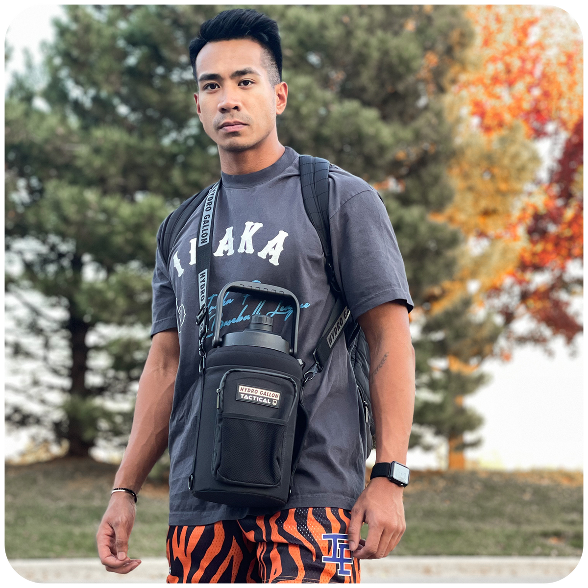 hydro gallon hydrogallon tactical one 1 gallon water bottle jug stainless steel metal double wall vacuum insulated pockets shoulder strap crossbody heavy duty keeps ice